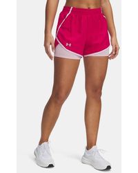 Under Armour - Pantalón Corto 2 En 1 Fly-By Para Mujer Shaded Fuchsia Prime Reflectante - Lyst