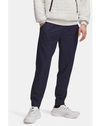 Under Armour - Unstoppable
Hose Mit Schmal Zulaufendem Bein Für Herren Midnight Blaue Marine Schwarz - Lyst