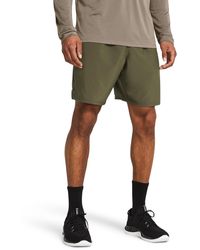 Under Armour - Woven shorts mit schriftzug für marine od - Lyst