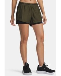 Under Armour - Tech Play Up
2-In-1-Shorts Für Damen Expedition Schwarz Schwarz - Lyst