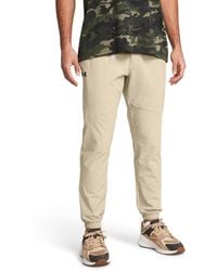 Under Armour - Joggers stretch woven - Lyst