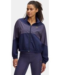 Under Armour - Giacca Rival Stretch Woven Holiday Da Donna Midnight Marino Porpora Prime Metallico Oro - Lyst