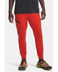 Under Armour - Jogger Unstoppable Fleece Da Uomo Surplus Nero - Lyst
