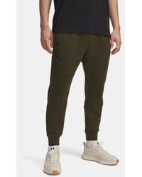 Under Armour - Jogger Unstoppable Fleece Da Uomo Expedition Nero - Lyst