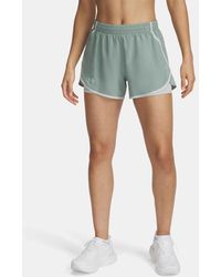 Under Armour - Shorts Fly-By 2-In-1 Da Donna Silica Hydro Riflettente - Lyst