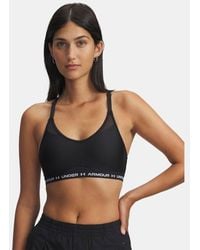 Under Armour - Crossback Low
Sport-Bh Für Damen Weiß - Lyst