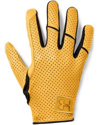 orange and black under armour football gloves