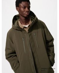 Uniqlo - Piumino Piume Ibride Riciclate Con Cappuccio - Lyst