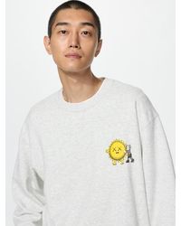 Uniqlo - Kaws Universe Ut Graphic Sweatshirt - Lyst