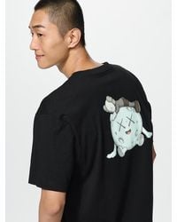 Uniqlo - Kaws Universe Ut Graphic T-Shirt - Lyst