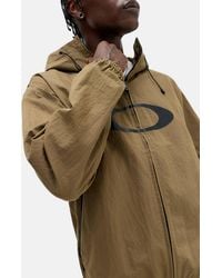 Oakley - Uo Exclusive Deep Olive Ripstop Jacket S At Urban Outfitters - Lyst