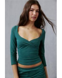 Out From Under - Bec Surplice 3/4 Sleeve Top - Lyst