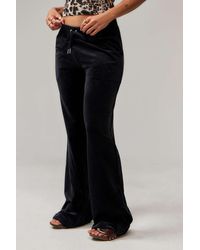 Juicy Couture - Low-rise Velour Flare Track Pants - Lyst