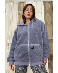 Urban Outfitters UO - Skaterjacke mit Kapuze aus Borg-Fleece - Lila
