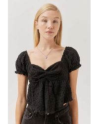Urban Outfitters Uo Beverly Textured Lace-up Babydoll Blouse - Black