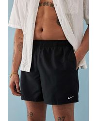 Nike - Solid Black Swim Shorts - Lyst
