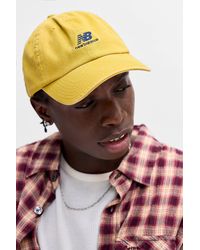 New Balance - Uo Exclusive Apollo Gold Cap - Lyst