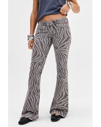 BDG - Miko Animal Print Low Rise Skinny Bootcut Jeans 24w 32l At Urban Outfitters - Lyst