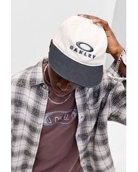 Oakley - Uo Exclusive Cream Flat Cap At Urban Outfitters - Lyst