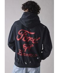 Urban Outfitters - Ford Bronco Paint Splatter Logo Hoodie Sweatshirt - Lyst