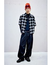 Oakley - Uo Exclusive Pitch Black Wide Leg Track Pants - Lyst