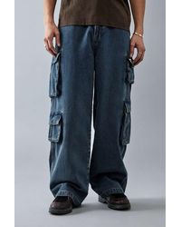 BDG - Cargo-jeans mit vielen taschen in schwarz und mittlerer waschung - Lyst