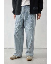 Ed Hardy - Uo Exclusive Light-wash Applique Jeans - Lyst