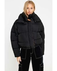 Urban Outfitters Uo Black And Orange Contrast Lined Pillow Puffer Jacket