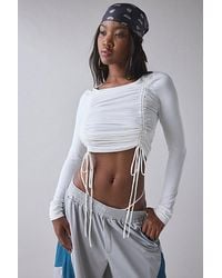 1st Position By Tinashe - Uo Exclusive Keep Up Ruched Adjustable Tie Long Sleeve Top - Lyst