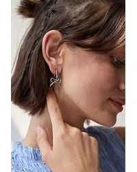 Urban Outfitters - Bow Huggie Hoop Earring - Lyst