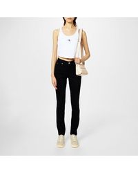 Calvin Klein - 011 Mid Rise Skinny Jeans - Lyst