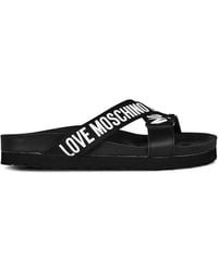 Love Moschino - Logo Cross Sliders - Lyst