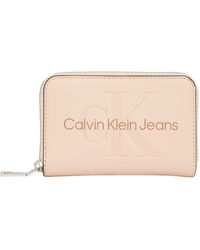 Calvin Klein - Sculpted Zip Around Purse - Lyst