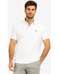 U.S. POLO ASSN. - Solid Interlock Polo Shirt With Woven Trim - Lyst