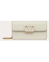 Valentino Garavani - Vlogo Signature Grainy Calfskin Wallet With Chain - Lyst