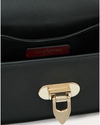 mini rockstud calfskin crossbody bag