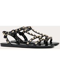 Valentino Valentino Garavani sandales basses rockstud en caoutchouc - Noir