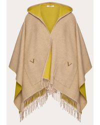 Valentino Garavani - V Detail Wool And Cashmere Poncho With Hood And Metal V Appliqué - Lyst