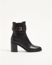 Valentino Garavani - Vlogo Embossed Calfskin Ankle Boot 75Mm - Lyst
