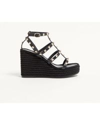 Valentino Garavani - Rockstud Ankle Strap Wedge Sandal - Lyst