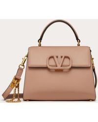 Women's Valentino Garavani Top-handle bags from $420 | Lyst
