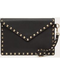 valentino rockstud clutch sale