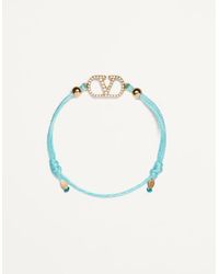 Valentino Garavani - Vロゴ シグネチャー コットン X スワロフスキー®クリスタル ブレスレット 女性 ターコイズブルー/クリスタル - Lyst