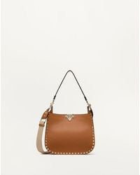 Valentino Garavani - Rockstud Hobo Bag Aus Genarbtem Kalbsleder Frau - Lyst
