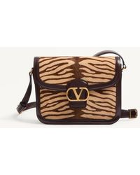 Valentino Garavani - SAC PORTÉ ÉPAULE 9TO5 EN CUIR DE VEAU IMITATION PONEY À IMPRIMÉ ANIMALIER - Lyst