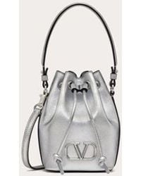 Valentino Garavani - Mini Vlogo Signature Bucket Bag In Metallic Nappa Leather - Lyst