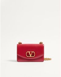 Valentino Garavani - Petit Sac Porté Épaule Vain En Cuir De Veau Brillant Femme Rosso - Lyst