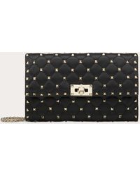 rockstud spike crossbody clutch