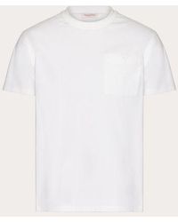 Valentino - T-shirt in cotone con v detail impunturata - Lyst