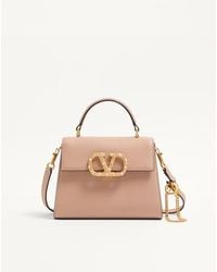 Valentino Garavani - Vsling Kleine Handtasche Aus Genarbtem Kalbsleder Mit Schmucklogo Frau - Lyst